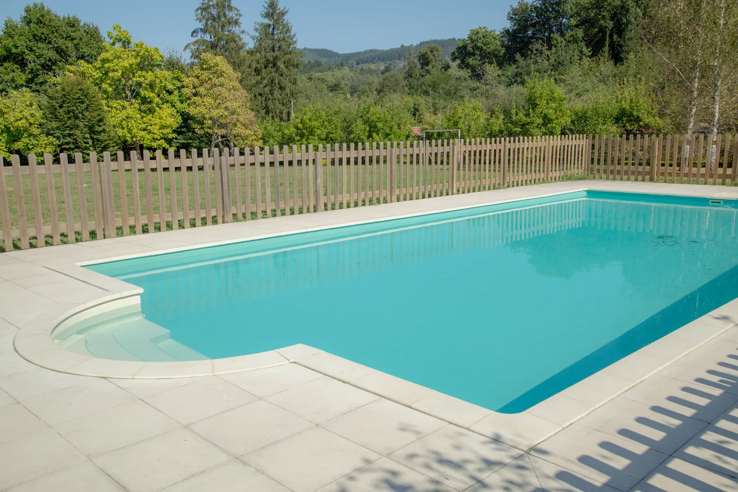 The outdoor pool at Amalurra, framed by the property’s gardens.