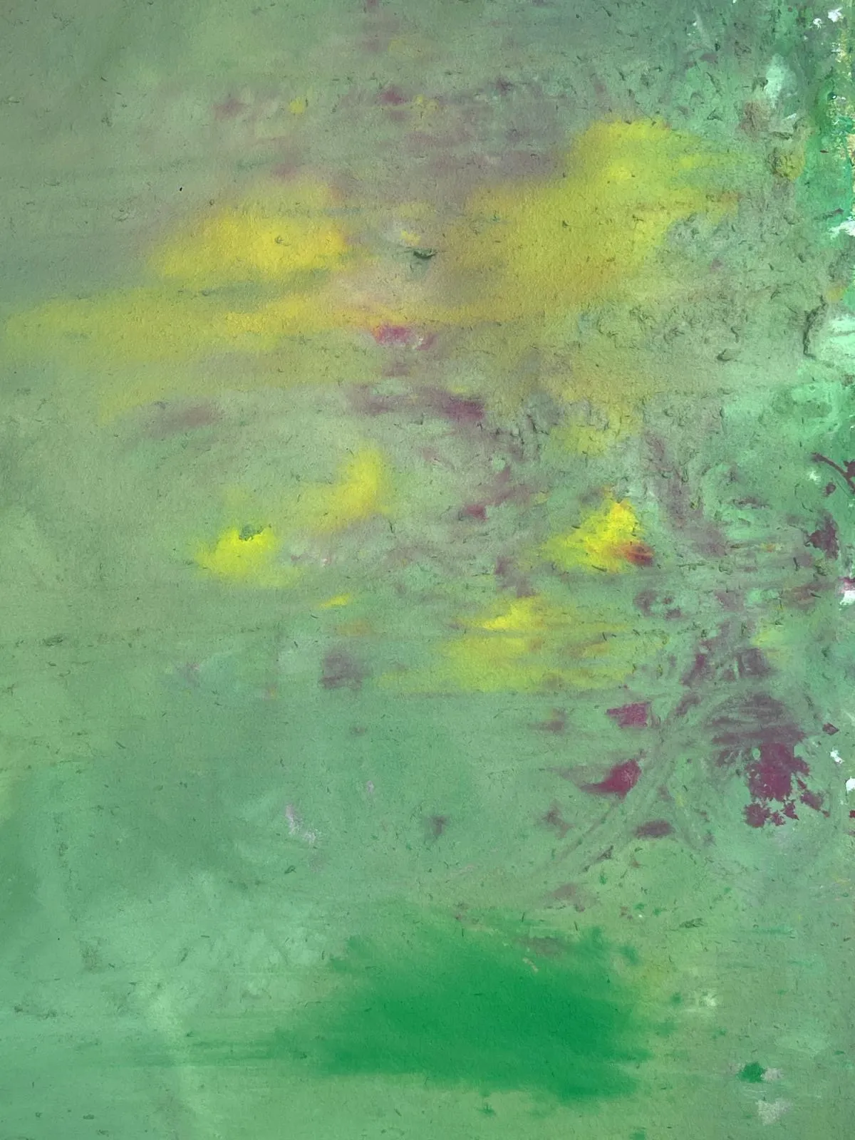 Abstract painting in sage green and teal, with yellow and crimson flecks scattered across a soft, layered ground