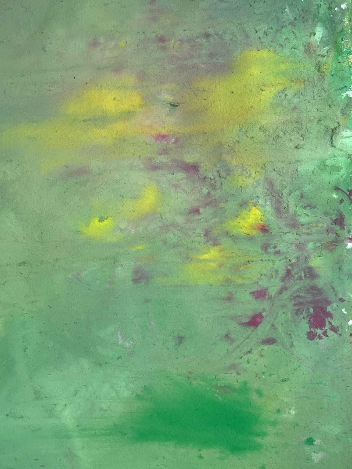 A vibrant abstract painting on paper — broad strokes of teal, green, and yellow ground laid out for drying.